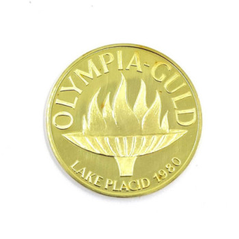 MEDAILLE JEUX OLYMPIQUES HIVER 80 15.00G OR JAUNE 18K