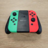 MANETTE JOYCON NINTENDO SWITCH ROSE VERT + SUPPORT CENTRALE