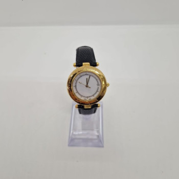 MONTRE COURREGES SOIR PLAQUE OR