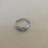 BAGUE OR BLANC 18CT  5.25GRS AVEC 1 TANZANITE OVALE 0.64 ET 16 DMTS 0.18CTS T.56
