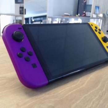 CONSOLE SWITCH OLED ORANGE/VIOLET MANQUE DOCK TV
