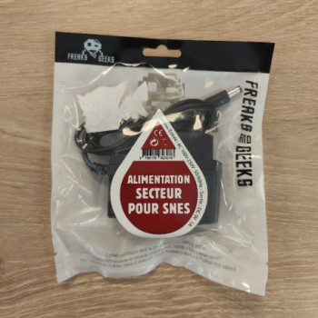 ADAPTATEUR SECTEUR SUPER NES FREAKS AND GEEKS