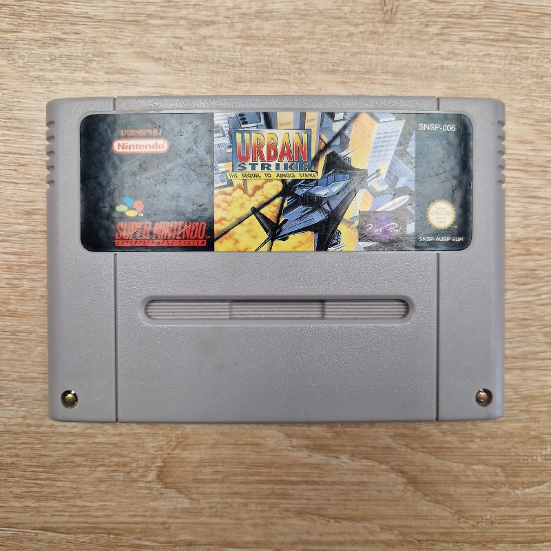 URBAN STRIKE THE SEQUEL TO JUNGLE STRIKE - SNES (CARTOUCHE) URBAN STRIKE THE SEQUEL TO JUNGLE STRIKE - SNES (CARTOUCHE)