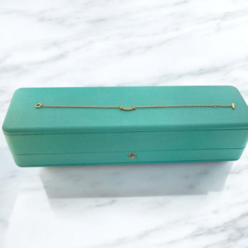 BRACELET TIFFANY  T SMILE OR 18CT ET DIAMANTS 1.64GR