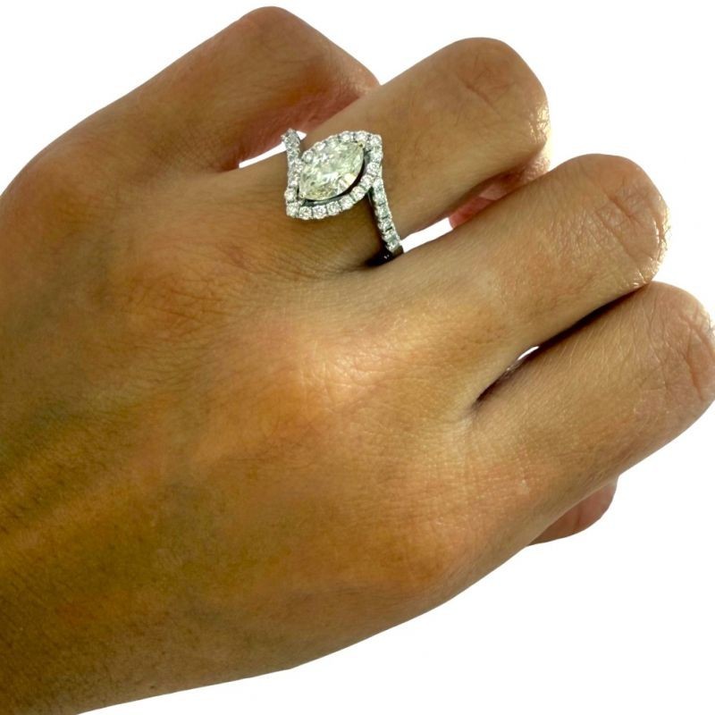 BAGUE OR BLANC 18CTS 1 DIAMNAT TAILLE MARQUISE