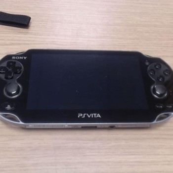 CONSOLE PSVITA + CHARGEUR + HOUSSE