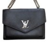 SAC LOUIS  VUITTON NOIR CUIR + FACTURE