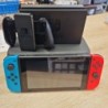 CONSOLE NINTENDO SWITCH BLEU & ROUGE + ACCESS ET FOURRE