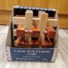 GRAND CASSE-TÊTE EN BOIS CUBE