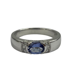 BAGUE OR BLANC 18CT  5.25GRS AVEC 1 TANZANITE OVALE 0.64 ET 16 DMTS 0.18CTS T.56